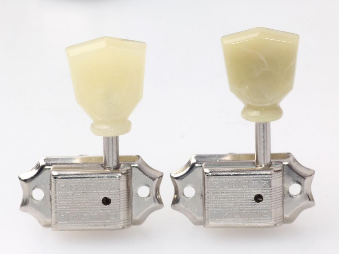 Left Vintage buttons - right Kluson Genuie